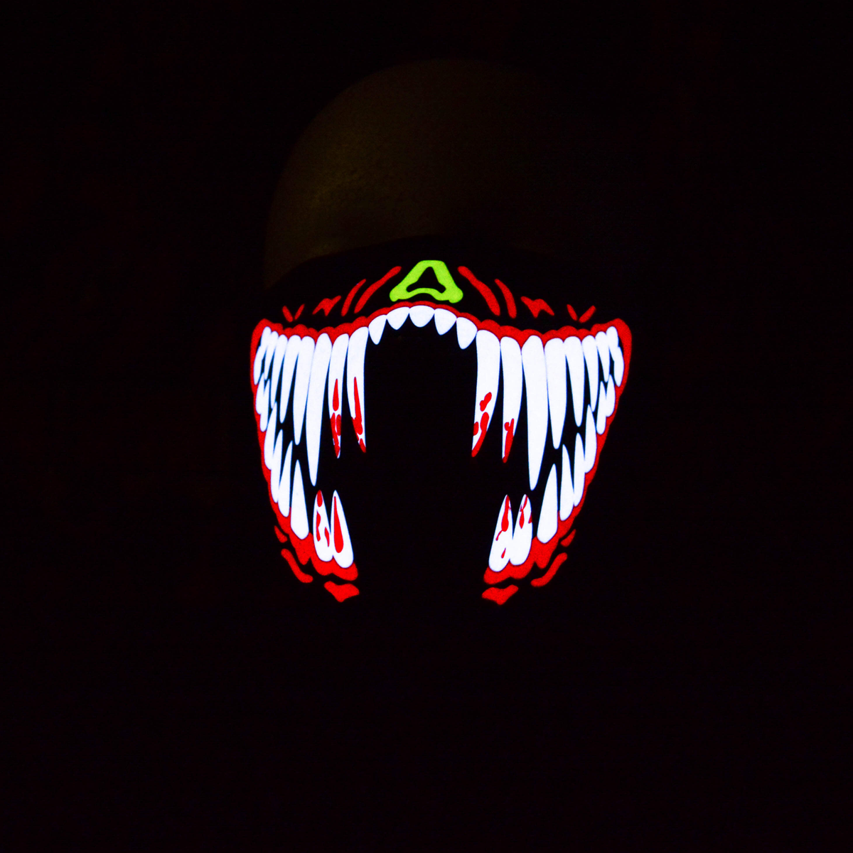 White Teeth Red Rave Mask in the dark
