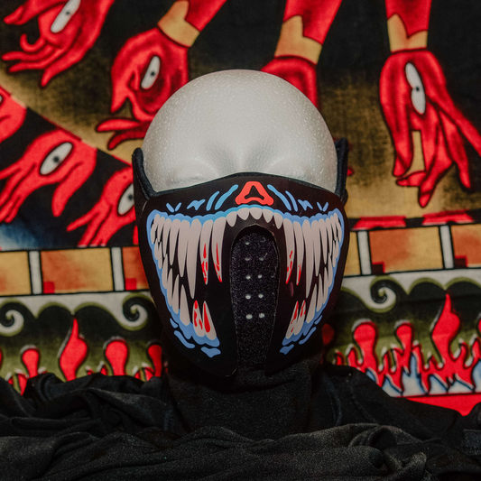 White Teeth Blue Rave Mask in the light 